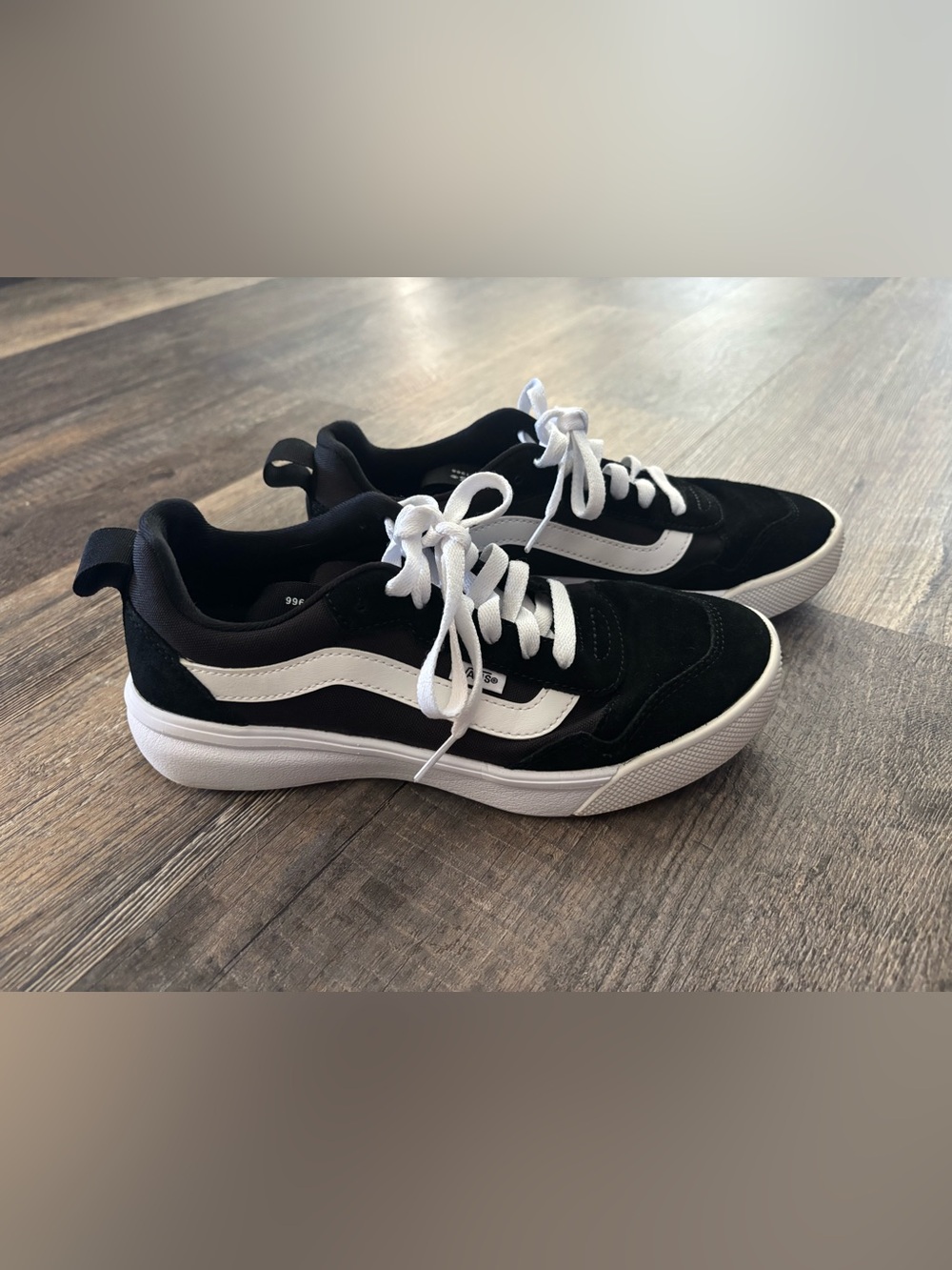 Vans Black and White Low-Top Skate Sneakers with White Side Stripe